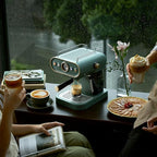 compact high-pressure coffee machine with steam frother
