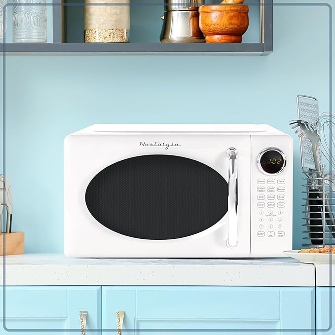 Nostalgia Retro Microwave Oven - 0.7 Cu Ft, 700-Watt Countertop Size with Glass Turntable, Child Safety Lock, 8 Auto-Cook Programs, Digital Clock - White